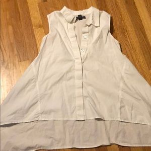 Fun, flared, sleeveless button down tunic